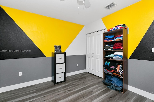 bonus room with dark hardwood / wood-style floors, ceiling fan, and lofted ceiling