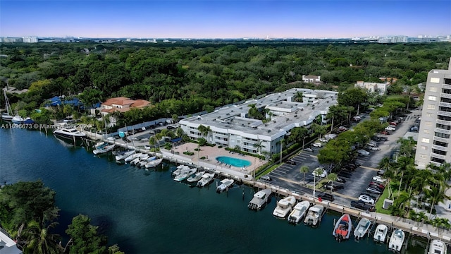 birds eye view of property featuring a water view