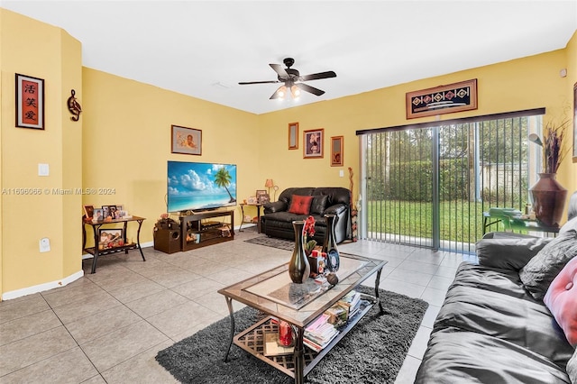 tiled living room with ceiling fan