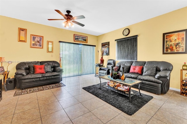 living room with ceiling fan and light tile patterned floors