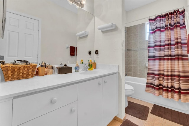 full bathroom featuring tile patterned floors, vanity, shower / bath combination with curtain, and toilet