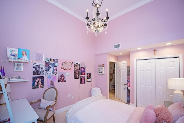 bedroom with light carpet, a towering ceiling, ornamental molding, an inviting chandelier, and a closet