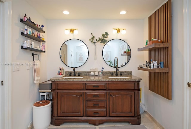 bathroom featuring tile patterned floors and vanity