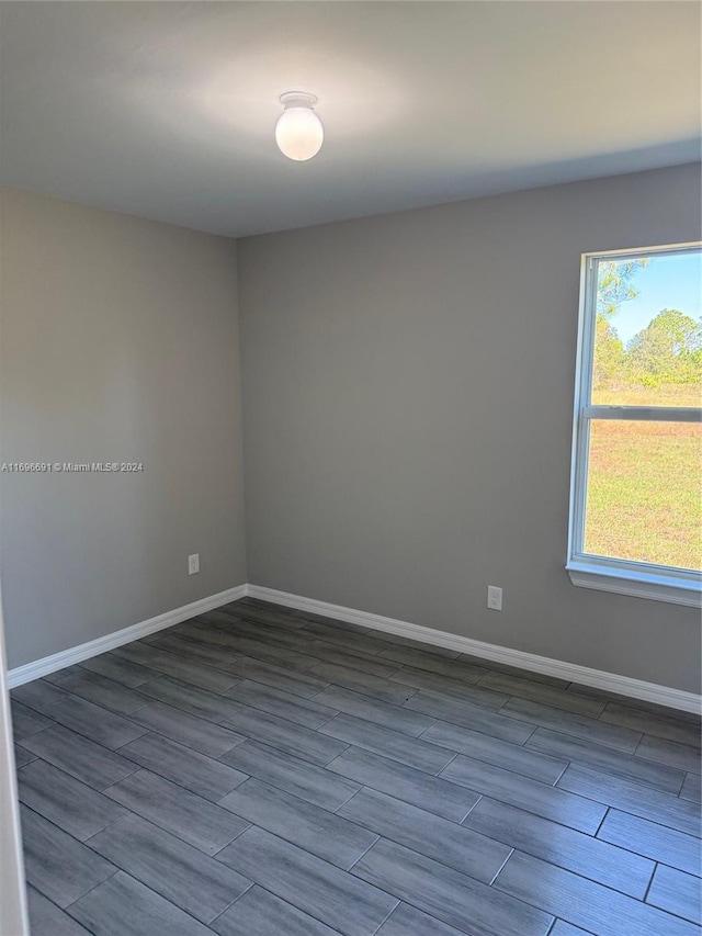 empty room featuring hardwood / wood-style flooring