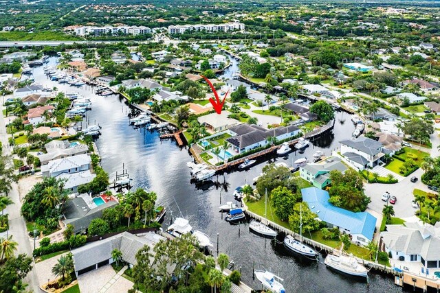 bird's eye view with a water view