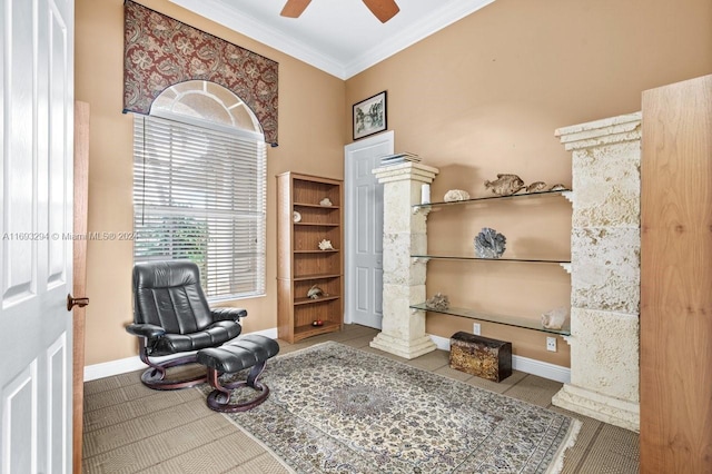 sitting room featuring tile patterned floors, ceiling fan, and ornamental molding