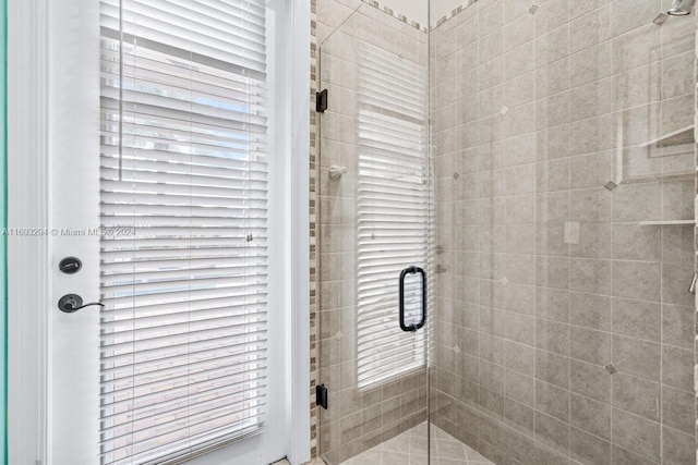 bathroom featuring an enclosed shower