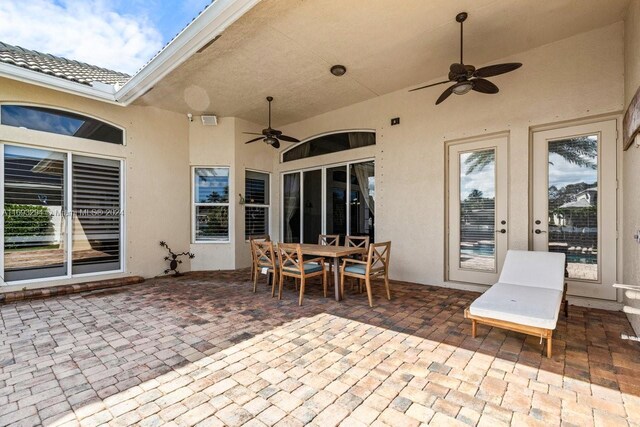 view of patio with ceiling fan