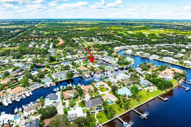 drone / aerial view with a water view