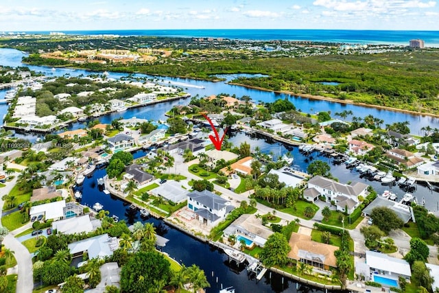 bird's eye view with a water view