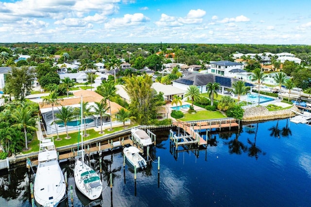 bird's eye view with a water view