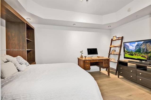 bedroom with light hardwood / wood-style flooring