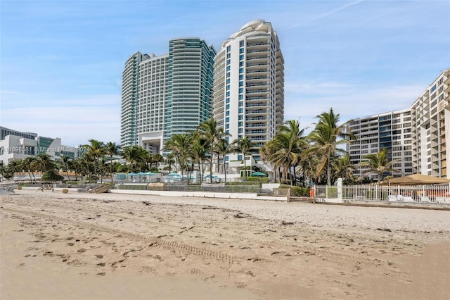 view of property featuring a beach view