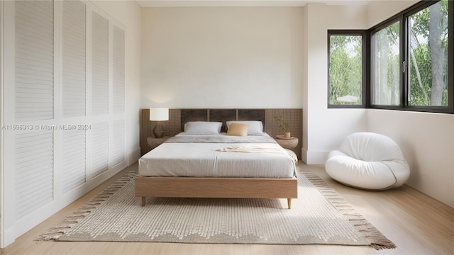 bedroom with light hardwood / wood-style floors