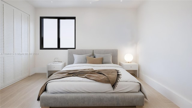 bedroom with light hardwood / wood-style flooring