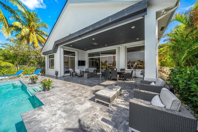 view of swimming pool featuring a patio