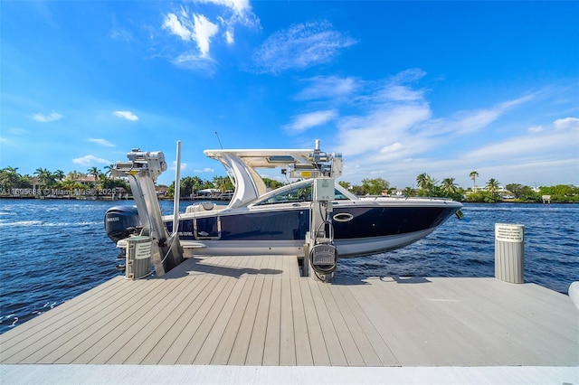 view of dock featuring a water view and boat lift