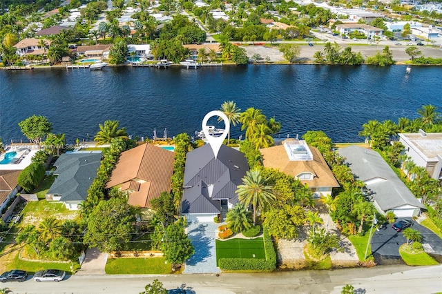 bird's eye view featuring a residential view and a water view