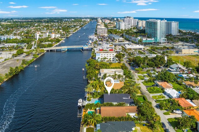 birds eye view of property featuring a water view