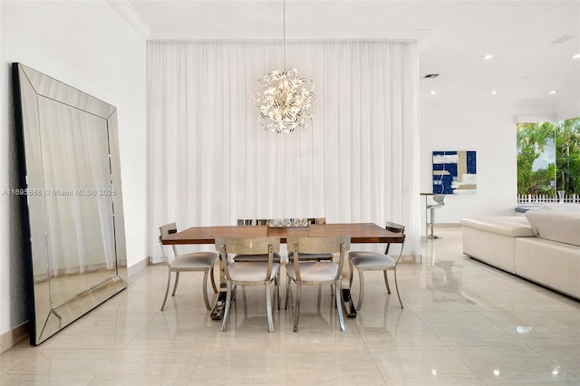 dining space with baseboards, visible vents, crown molding, and recessed lighting