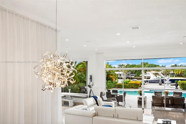 living room with a notable chandelier