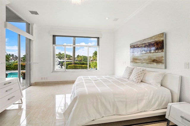 bedroom featuring light tile patterned floors, access to outside, and ornamental molding