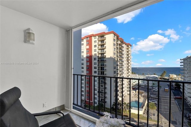 balcony featuring a water view