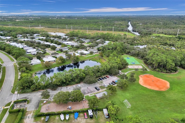 drone / aerial view with a water view