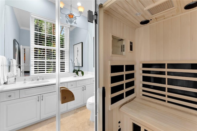 814 W Dilido Dr, Miami Beach, FL 33139 - bathroom featuring a sauna / steam room, vanity, toilet, tile patterned flooring, and ornamental molding