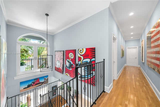 814 W Dilido Dr, Miami Beach, FL 33139 - corridor with an upstairs landing, wood finished floors, ornamental molding, baseboards, and recessed lighting