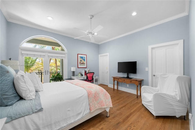 814 W Dilido Dr, Miami Beach, FL 33139 - bedroom with french doors, access to exterior, crown molding, wood finished floors, and recessed lighting