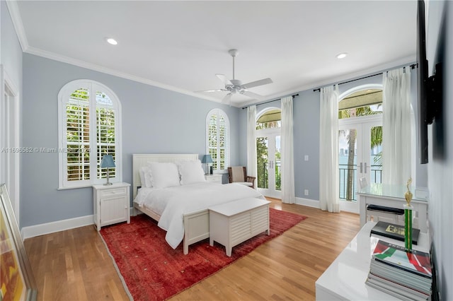 bedroom with french doors, access to outside, ceiling fan, crown molding, and light hardwood / wood-style flooring