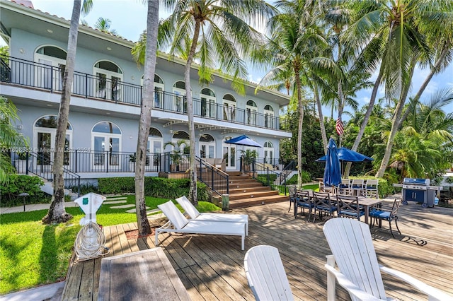 814 W Dilido Dr, Miami Beach, FL 33139 - deck featuring outdoor dining space and french doors
