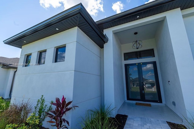 doorway to property featuring french doors