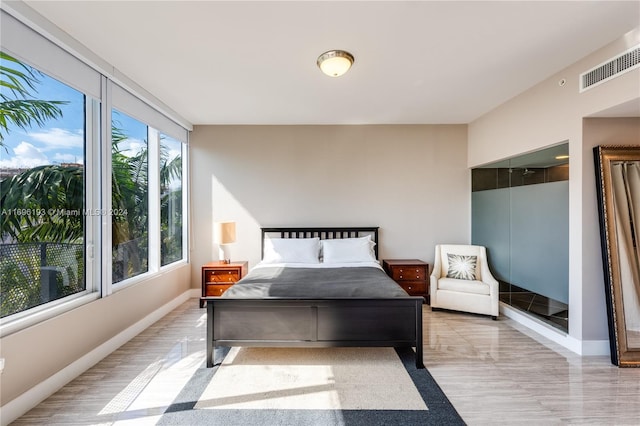 bedroom featuring light wood-type flooring