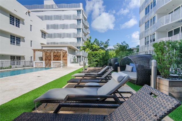 view of patio / terrace featuring a community pool