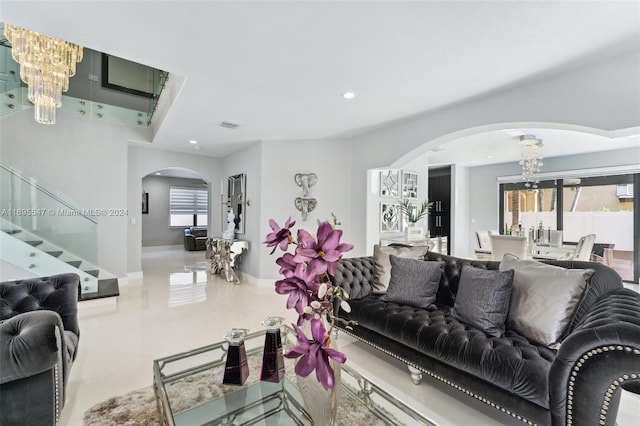 living room featuring an inviting chandelier