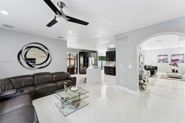 living room with ceiling fan