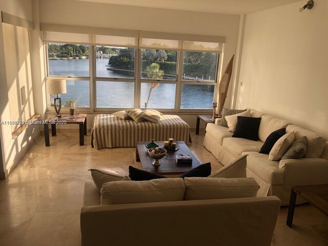 living room featuring a water view