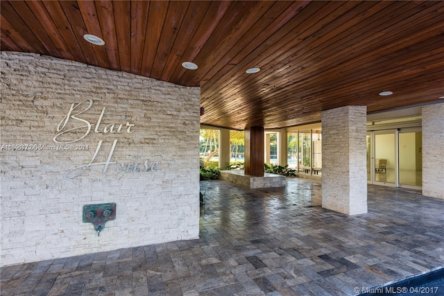 interior space featuring decorative columns