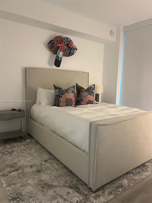 bedroom featuring hardwood / wood-style floors