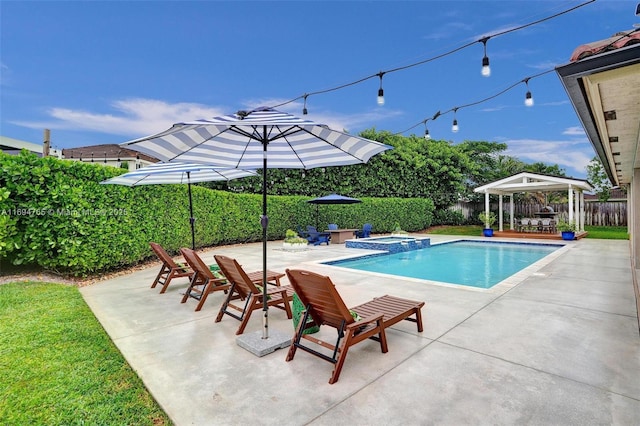 view of pool featuring a patio, an in ground hot tub, and a gazebo