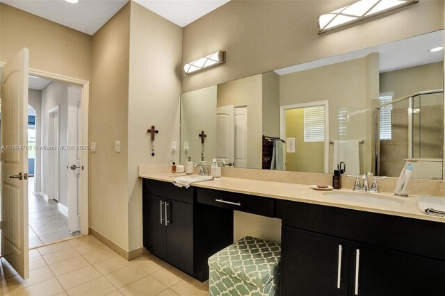 bedroom with light tile patterned floors and a closet