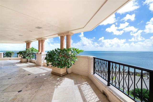 balcony featuring a water view