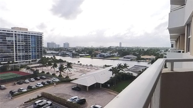 balcony featuring a water view