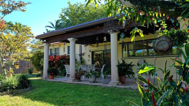 view of patio / terrace featuring ceiling fan