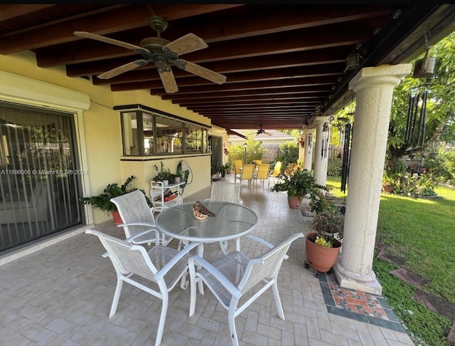 view of patio / terrace featuring ceiling fan