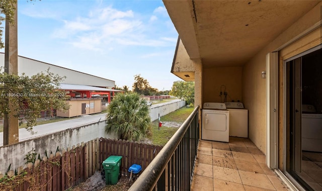 balcony featuring separate washer and dryer