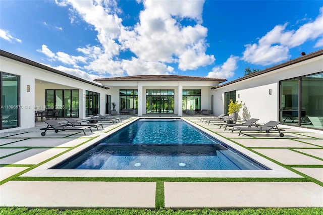 view of pool featuring a patio area