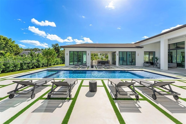 view of pool with a patio area